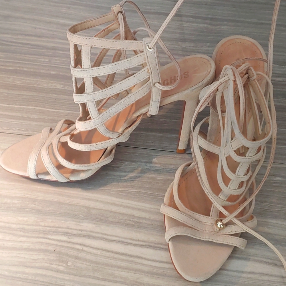 Size 8.5 Schultz leather strap heel.